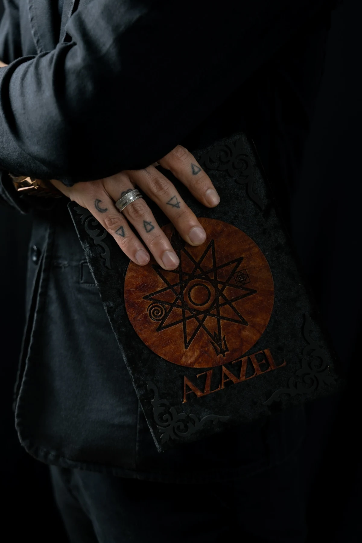 Detail of the grimoire in Azazel Qayin’s hands